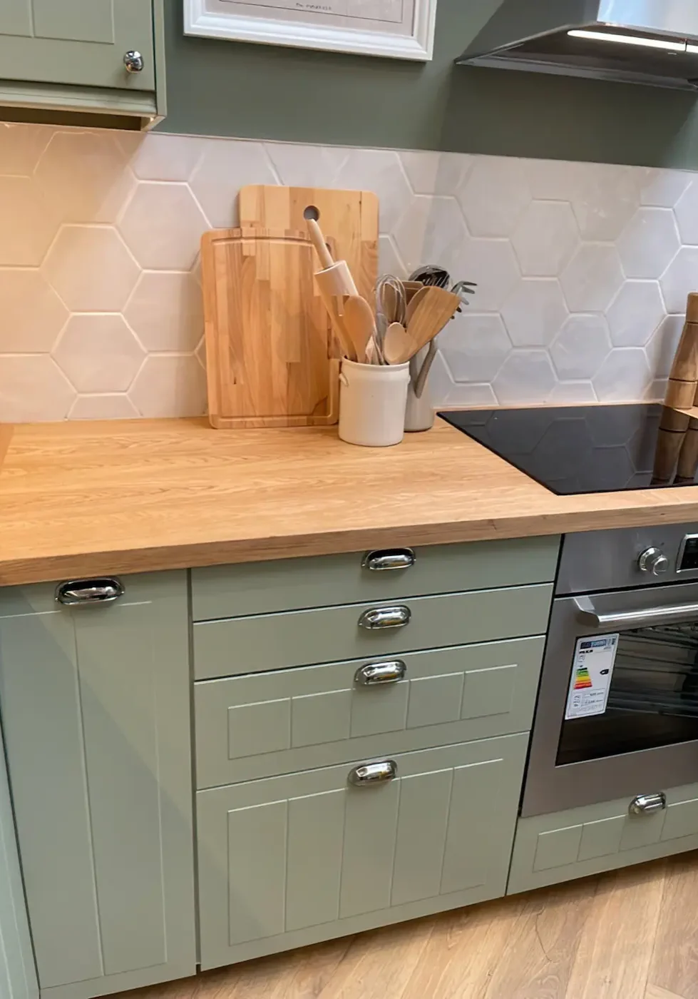 Detail of an open kitchen floor plan with beautiful wooden counter tops